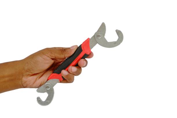 istock Self Adjusting Wrench, Universal Quick Grip Pipe Spanner Metal Durable. metal hand tools for screwing and tightening nut or bolt isolated on a white background. Closeup of adjustable end wrench. 1805184732