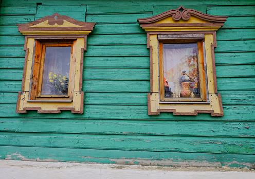 Wooden frames with glass windows of ancient house.