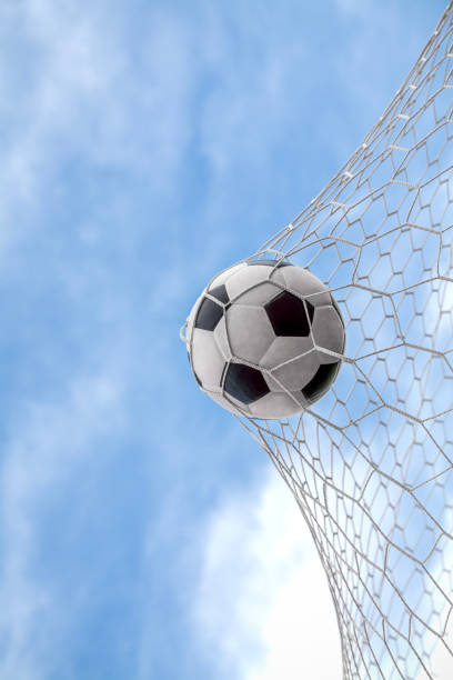 istock soccer ball on goal with net background 1805189281
