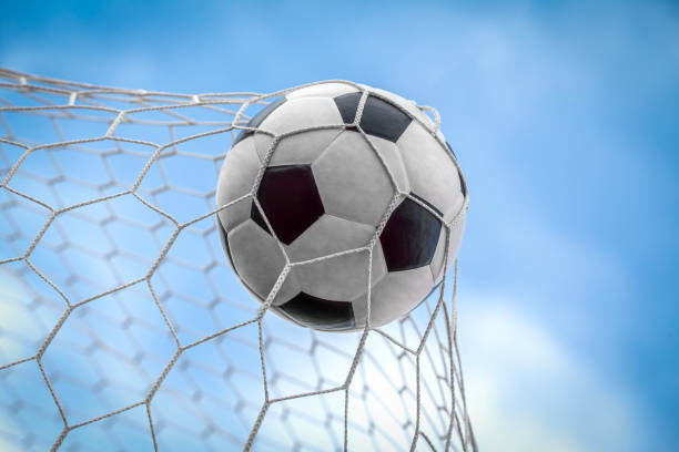 istock soccer ball on goal with net background 1805189287