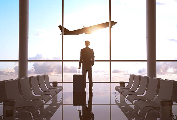istock businessman in airport 180520428