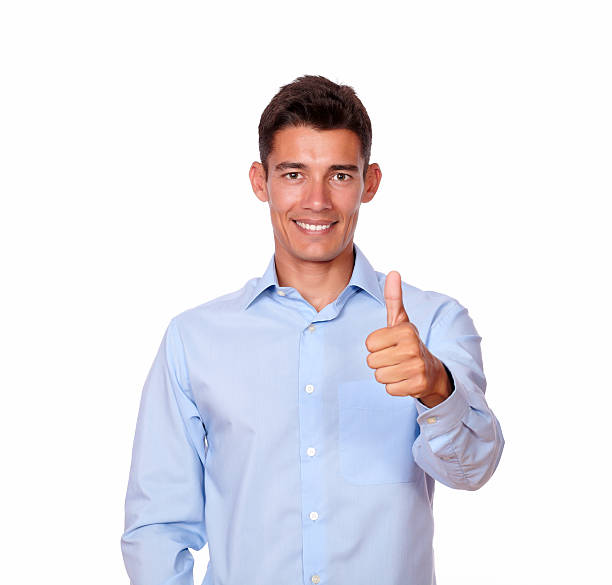istock Handsome man is smiling happy with thumbs up sign. 180520489