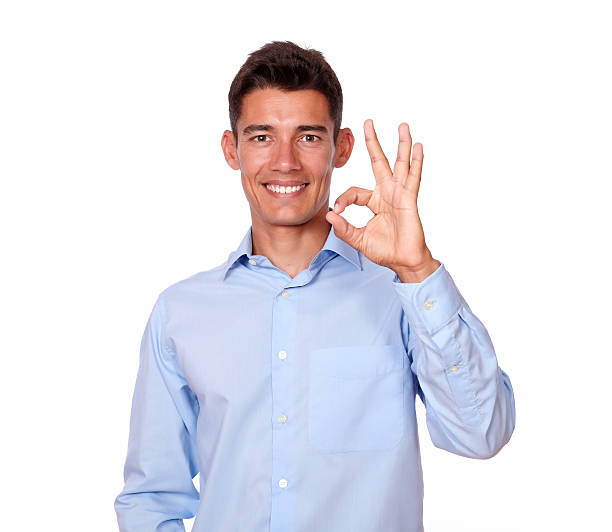 istock Handsome male in blue shirt making ok sign. 180521924