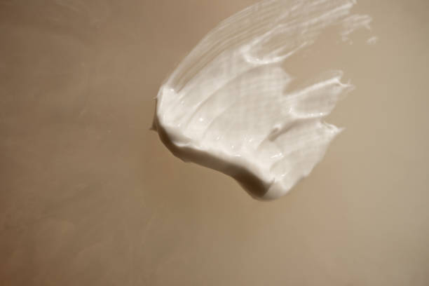 istock A smear of cream on a light background. Beauty concept. 1805233038