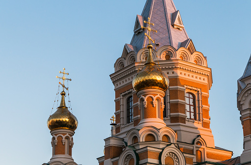 Uralsk, Kazakhstan (Qazaqstan), 15.11.2019: Cathedral of Christ the Savior in the city of Uralsk. Golden domes with crosses