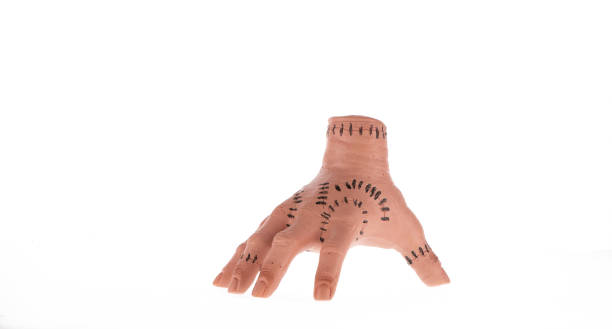istock Halloween scary Hand Thing isolated on white background 1805247832