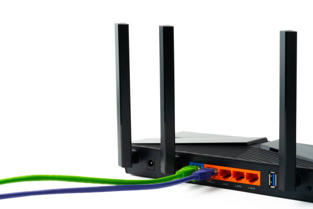 istock Modern router with cables plugged in close up 1805271330