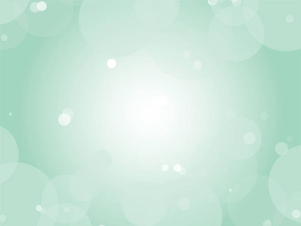 istock Beautiful and ephemeral abstract polka dot gradation background_emerald green 1805294091
