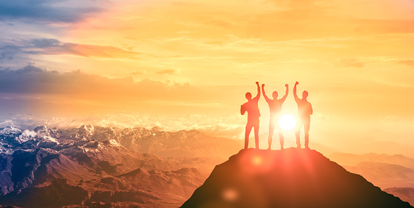 Silhouette Team of climbers man on mountain top. successful teamwork in business. Business Collaboration Colleague Occupation Partnership Teamwork concept