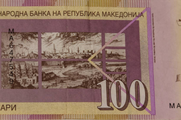 macro shot of one hundred macedonian denar banknote - denar imagens e fotografias de stock