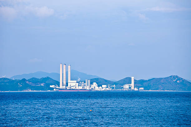 istock Power plant at day along coast 180531807