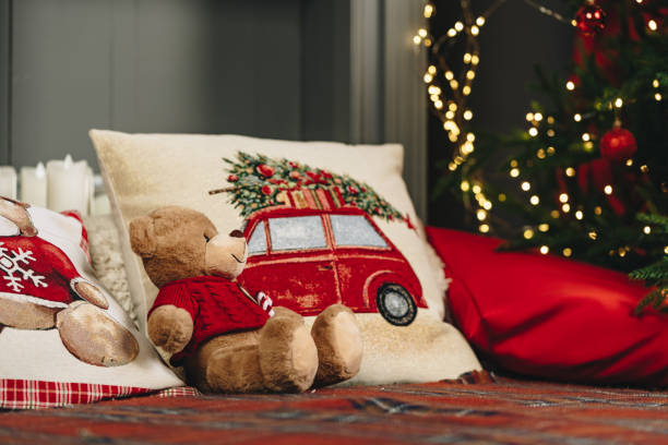 istock Teddy bear on bed with pillows for Christmas decoration 1805338968