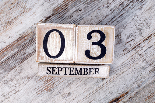 September 3, wooden calendar background