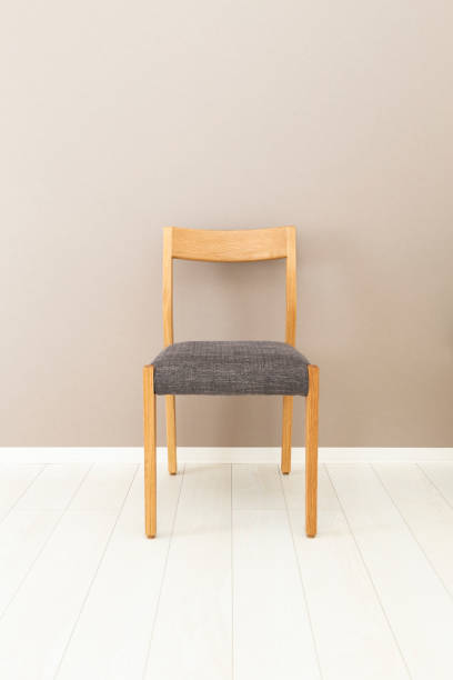 istock chair placed in front of the wall 1805359444