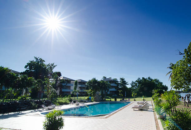 istock Swimming pool  in back of luxury home 180537302