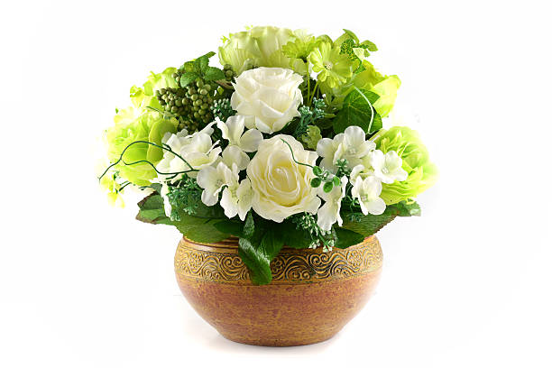 istock Multicolored flowers in a vase, isolated on white background 180537558