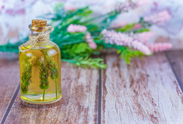 istock glass bottle with lavender oil 1805380110