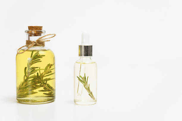 istock bottle and dropper with rosemary essential oil 1805380143