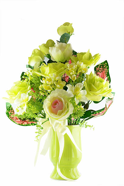 istock Multicolored flowers in a vase, isolated on white background 180538427