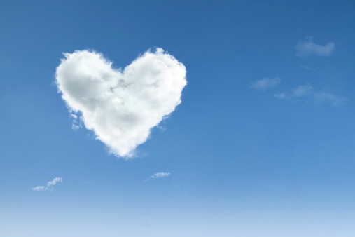 Love cloud with heart shape floating on blue sky