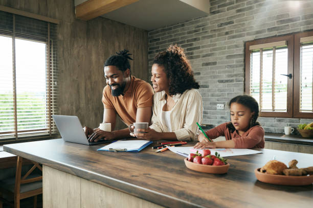 istock Happy black family spending time at home. 1805397960