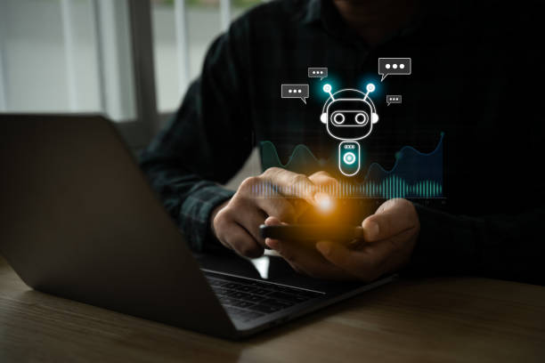 istock Businessman use smartphone mobile phone with digital chatbot, chat GPT, robot application, conversation assistant, AI Artificial Intelligence concept, digital chatbot virtual screen. Automatic AI. 1805401884