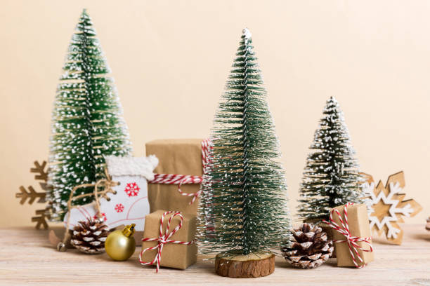 istock Christmas composition. Gifts, small tree, branches and craft DIY decorations on white background. New year concept. Christmas home decoration Flat lay, top view, copy space 1805439461