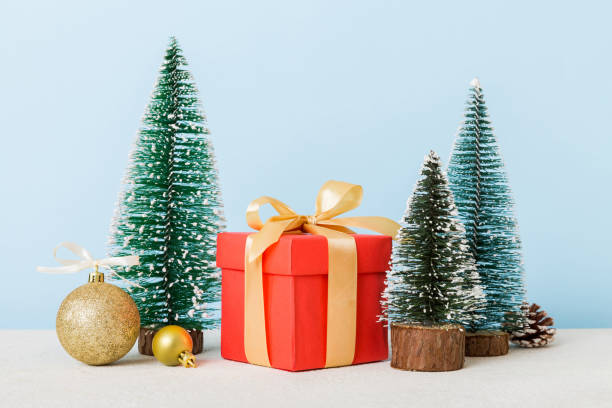 istock Christmas composition. craft Gift box, small tree, branches and craft DIY decorations on white background. New year concept. Christmas home decoration Flat lay, top view, copy space 1805439470