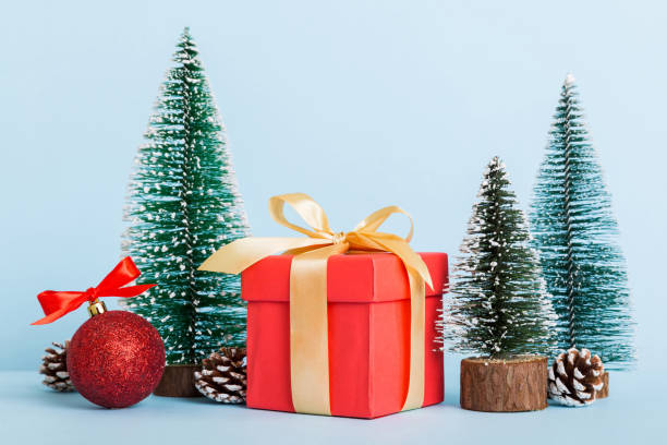 istock Christmas composition. craft Gift box, small tree, branches and craft DIY decorations on white background. New year concept. Christmas home decoration Flat lay, top view, copy space 1805439482