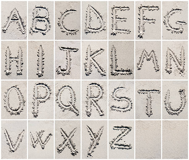 Composition of sand beach alphabet