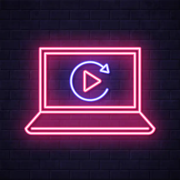 Vector illustration of Replay on laptop. Glowing neon icon on brick wall background