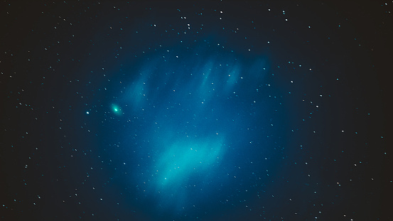 Comet C 2022 E3 (ztf) Shines Bright Green Color In Dark Night Starry Sky. Comet At A Distance Of 170 Million Kilometers.
