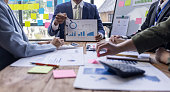 group-of-confident-business-people-point-to-graphs-and-charts-to-analyze-market-data-balance.jpg?b=1&s=170x170&k=20&c=IyqsanKpPLY7SGDMBOiJNAe-A3wZJiiNS37Bcs4MbYA=