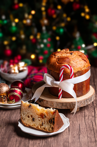 Traditional Czech and Slovak Christmas sweet plaited bread called vanocka (in Slovak vianocka). Handmade Christmas pastry on a festively set table.