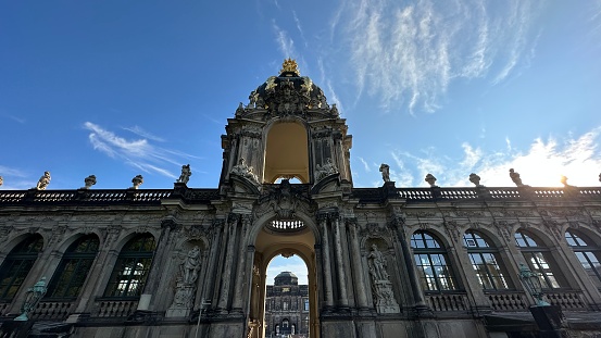 Dresden, Germany – September 2, 2023: Entrance gate of The Zwinger, a baroque palace complex in the center of Dresden, Germany.