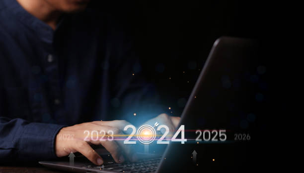 istock Countdown to 2024 concept. the taps a virtual download bar with a loading progress meter on New Year's Eve, turning the year 2023 to 2024. 1805475035