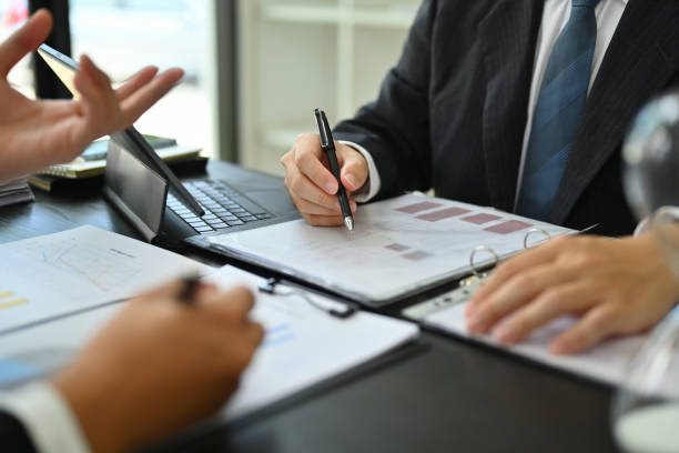 istock Business team discussing project details and business plan at co working space in office 1805476612