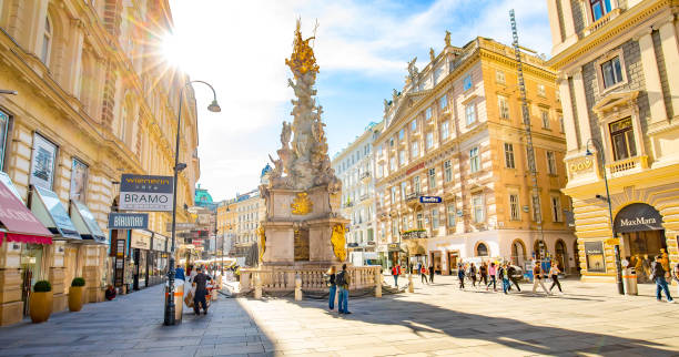 Famous central Graben street and The Plague Column in Vienna old town, Austria Vienna, Austria - 21 May, 2023: Famous central Graben street and The Plague Column in Wien old town people shopping in graben street vienna austria stock pictures, royalty-free photos & images