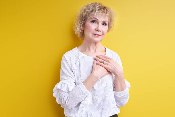 istock Good-looking senior woman feeling gratitude, expressing thanks 1805496765