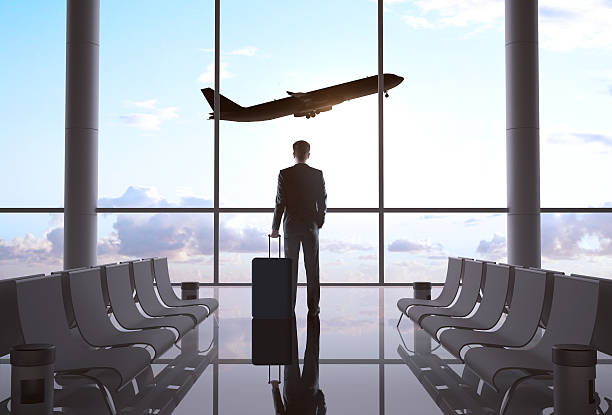istock businessman in airport 180550205
