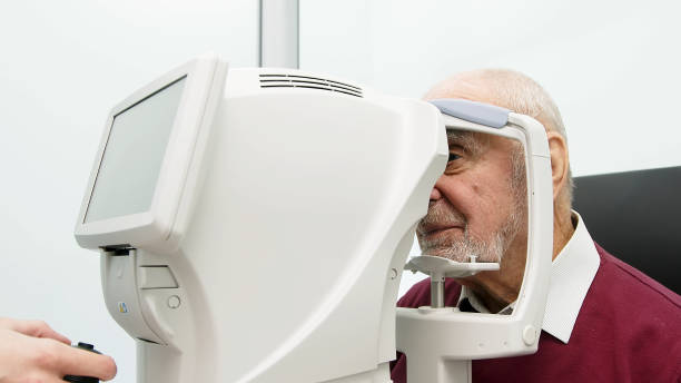 istock An elderly man undergoes an eye examination in a modern clinic. An expert checks vision using diagnostic ophthalmological equipment. 1805504009
