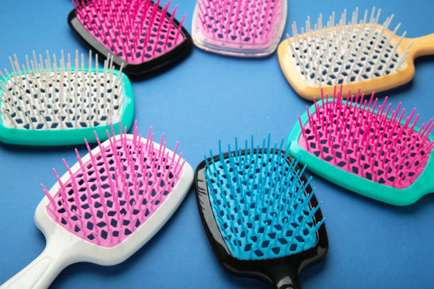 istock Set of hairbrushes on dark blue background. Flat lay 1805505710