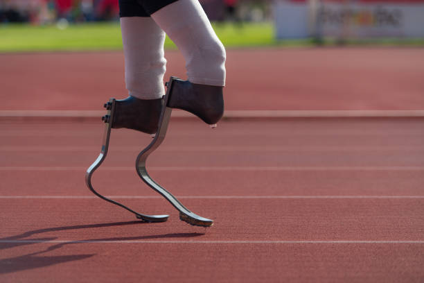 istock Disabled athletes with running blade used for short races on a running track. 1805511368