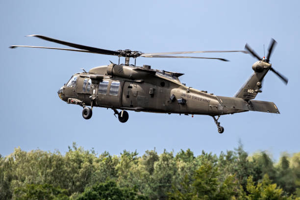 Sikorsky UH-60M Black Hawk helicopter US Army Sikorsky UH-60M Black Hawk helicoptes arriving at an air base. Eindhoven, The Netherlands - June 6, 2020 sikorsky uh 60 blackhawk stock pictures, royalty-free photos & images