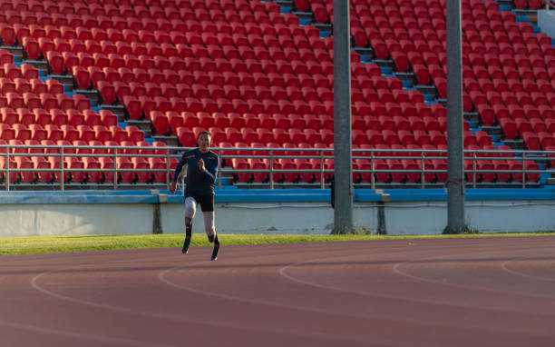 istock Athletes with disabilities who utilize running blades for short distances. Run down the running track. 1805534375