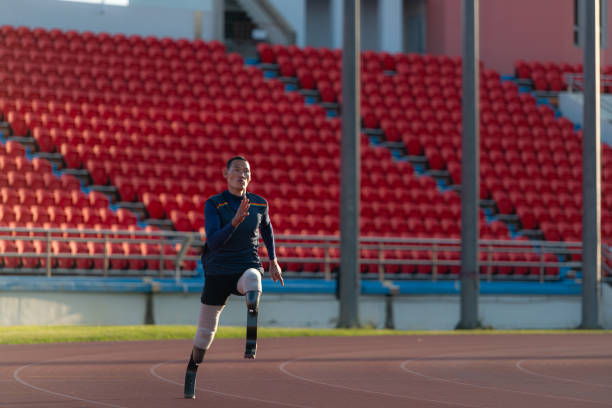 istock Athletes with disabilities who utilize running blades for short distances. Run down the running track. 1805534853
