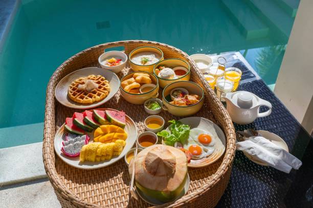 istock Phuket Local Delights Breakfast Set in a Floating Basket by a Swimming Pool 1805549156