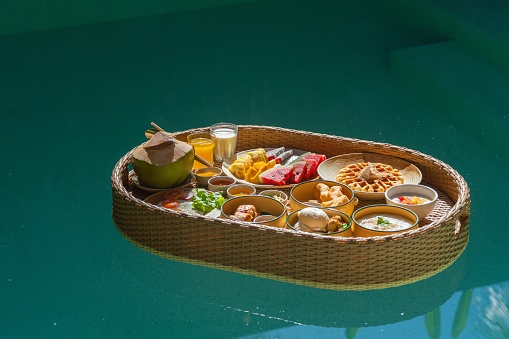 Photo of a set of Floating Breakfast Basket Set - Phuket Local Delights in a Private Swimming Pool