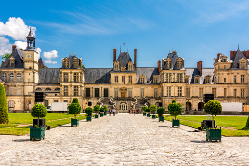 Fontainebleau, France - May 2019: Fontainebleau palace (Chateau de Fontainebleau) outside Paris