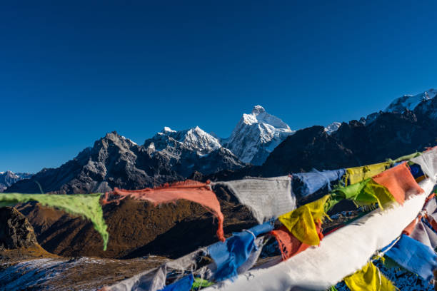Early morning sunrise in the hImalayas of Nepal with Mt. Kumbhakarna (Jannu HImal) and mountains Early morning sunrise in the hImalayas of Nepal with Mt. Kumbhakarna (Jannu HImal) and mountains kangchenjunga stock pictures, royalty-free photos & images